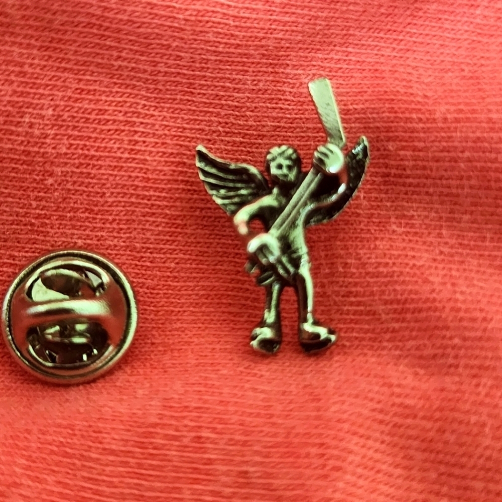 Silver hockey angel pin